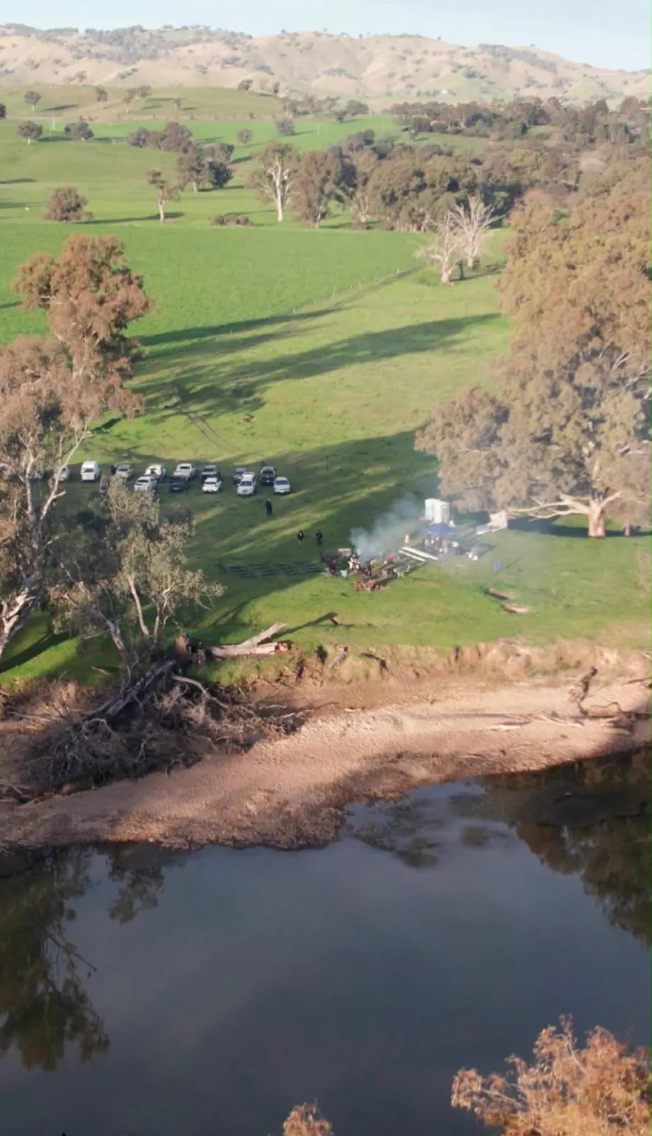 Aerial view over the river and surrounding paddocks at the retreat site